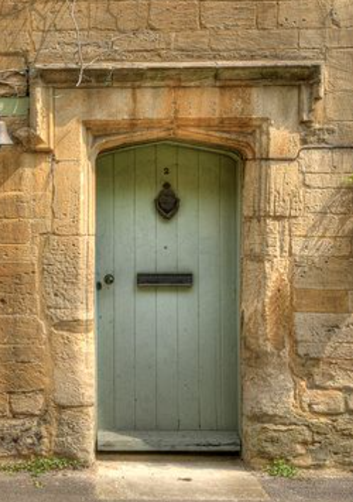 pastel door for stone house